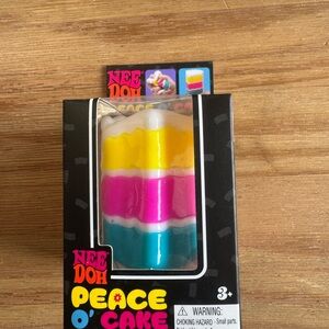 Nee Doh Peace O'Cake Rainbow Squeeze Toy - Yellow Pink Blue
